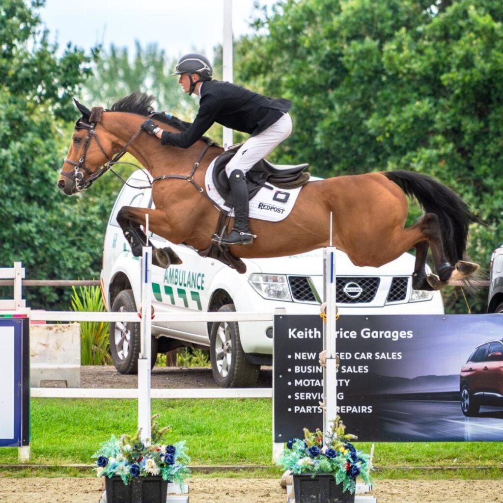 Redpost Rider Jake Myers competing in showjumping.