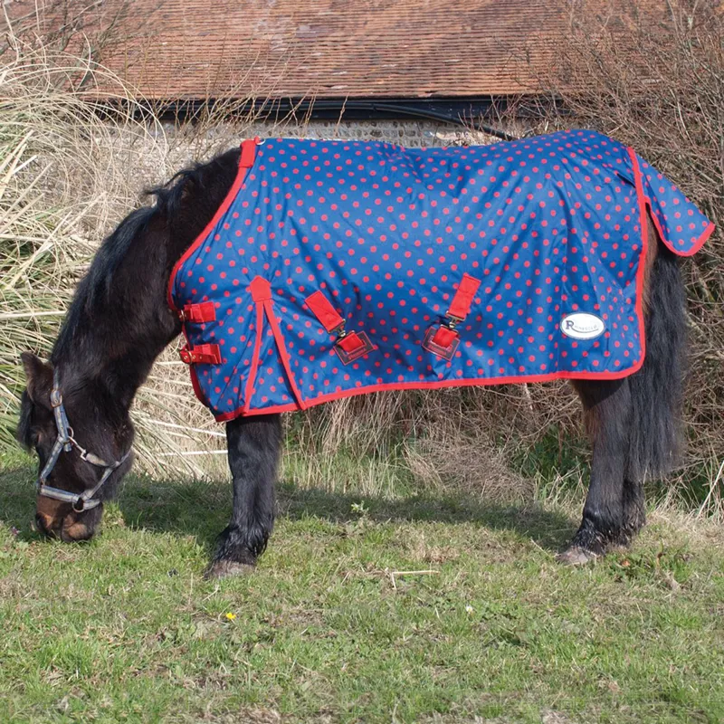 Rhinegold Torrent Foal/Small Pony 0g Turnout Rug - Navy/Red Spot